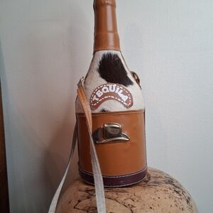 Brown Vegan Leather Wrapped Tequila Bottle With Hat And Faux Fur Design